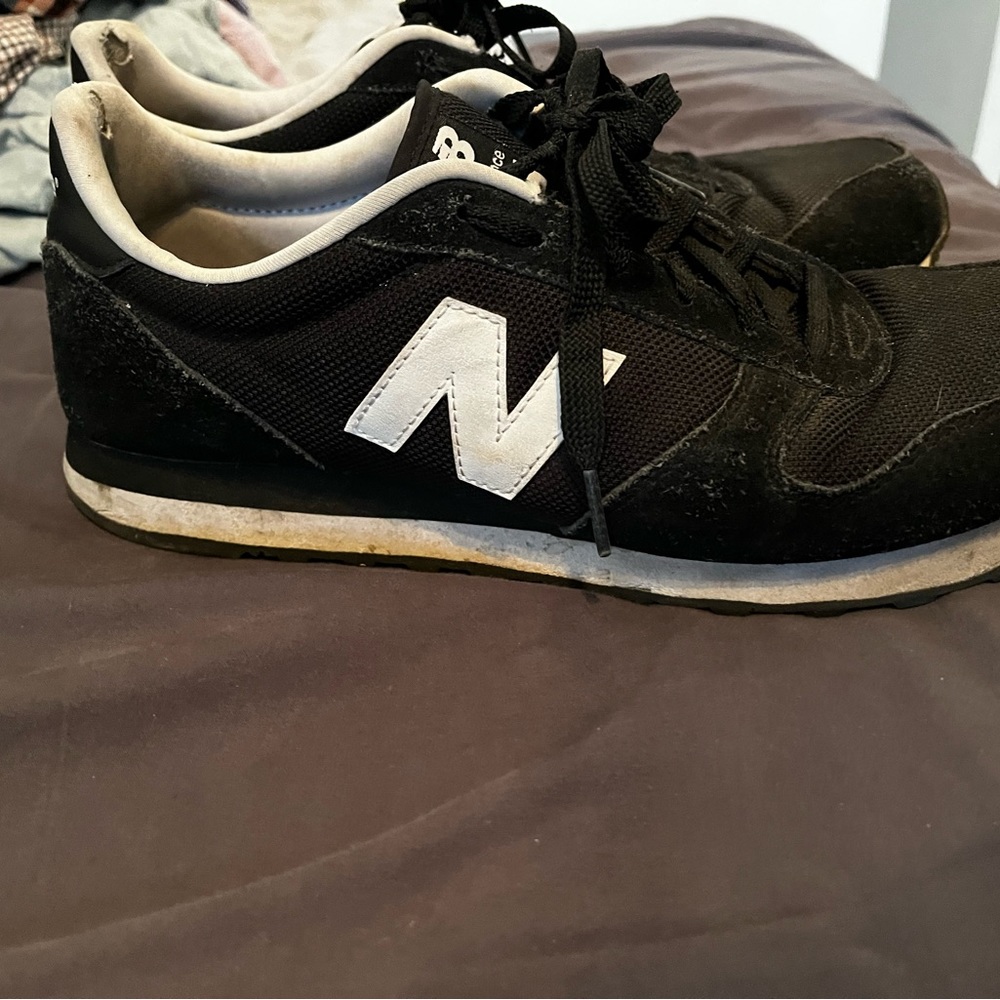 New Balance 311 Shoes.